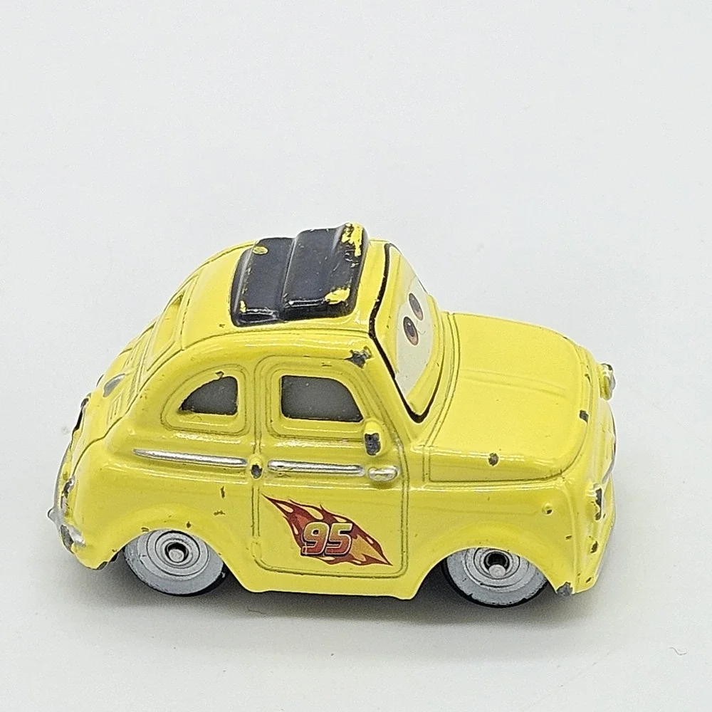 Disney Pixar Cars Luigi Yellow Diecast Car 95 Flame Side Toy Loose 2.5 Inch